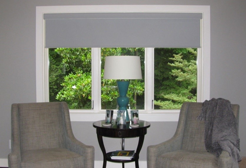 Motorized blackout roller shades