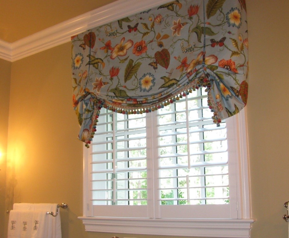Plantation shutters paired with a valance