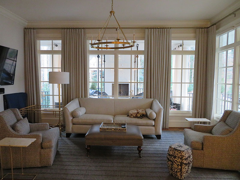 Living-Room-Inverted-Pleat-Panels-Gold-Hardware