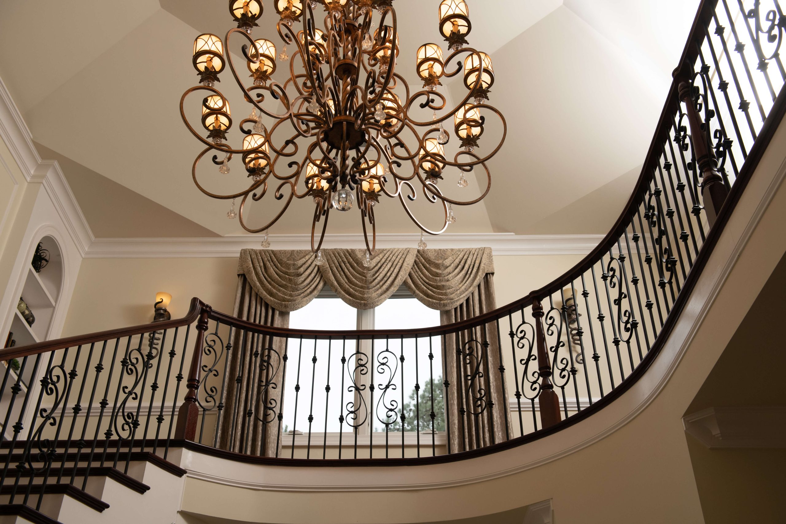 An image of a railing and chandelier.